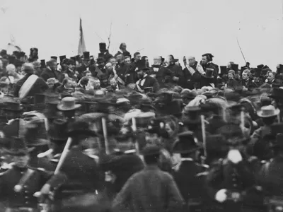 One of just two confirmed photographs of Abraham Lincoln (seated in center, facing the camera) at Gettysburg on the day of his address