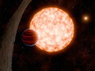 An artist&#39;s interpretation of the newly discovered planet and a warped debris disk