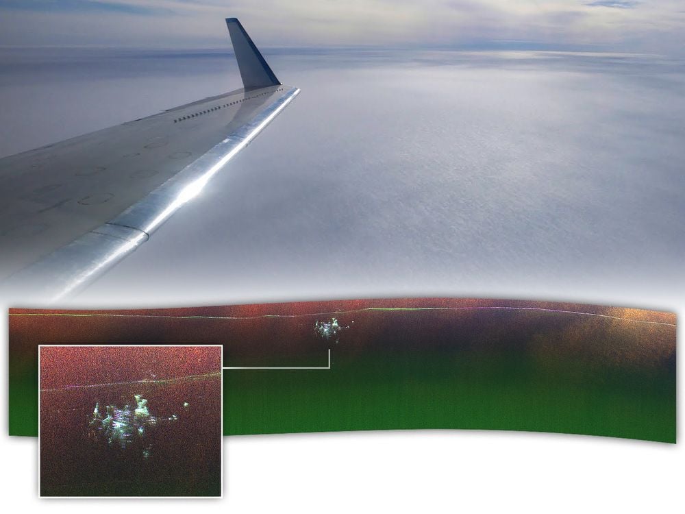 a view out the window of an airplane, with the bottom part shown in radar, depicting a lot of dots concentrated in one area