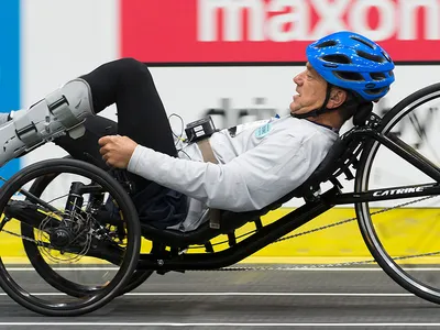 Mark Muhn of Team Cleveland on his way to winning the Functional Electrical Stimulation bike race in the inaugural Cybathlon in 2016. Muhn&rsquo;s legs are paralyzed; the muscles in them are activated by electric signals from a controller outside of his body.