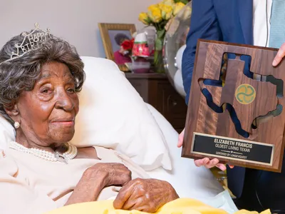 Elizabeth Francis received a plaque for being the oldest living Texan at her 114th birthday celebration last year.