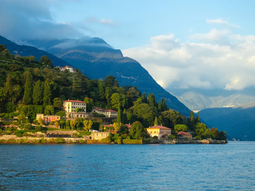 Lake with mountains behind it