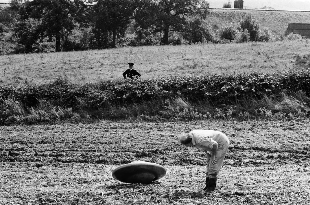 Dick Jennings looks at the object he found in a field near Chippenham on September 4, 1967.