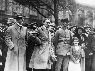 Hitler stands with co-conspirators Alfred Rosenberg and Friedrich Weber during the Beer Hall Putsch in November 1923.