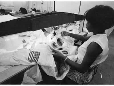 Hazel Fellows sews pieces of an Apollo A7L spacesuit on the production line at International Latex Corporation (ILC) in 1968.