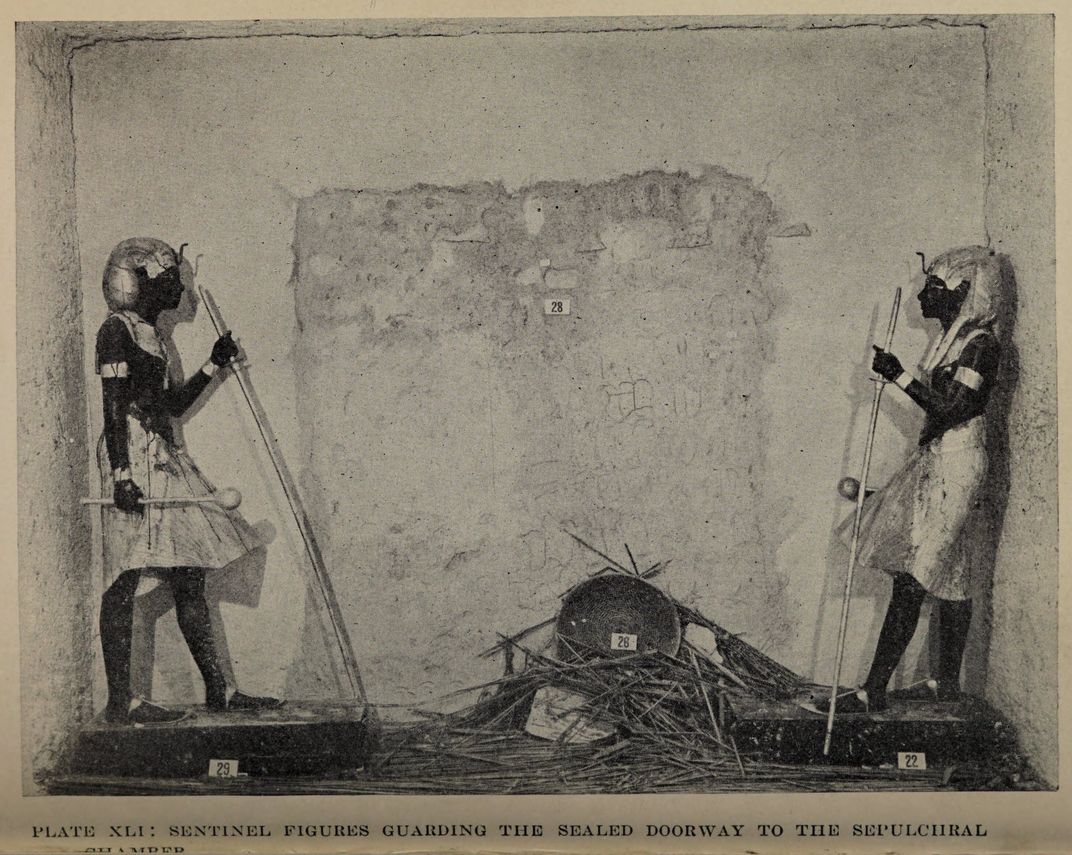 Two statues guarding King Tutankhamun's tomb