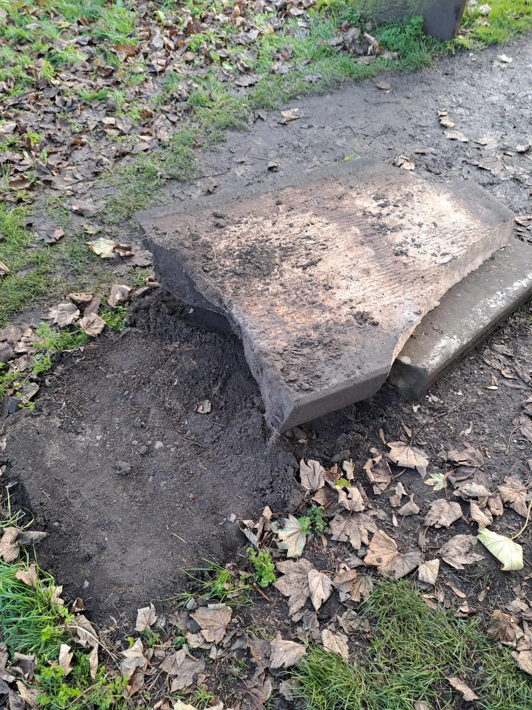 Ebenezer Scrooge's vandalized grave