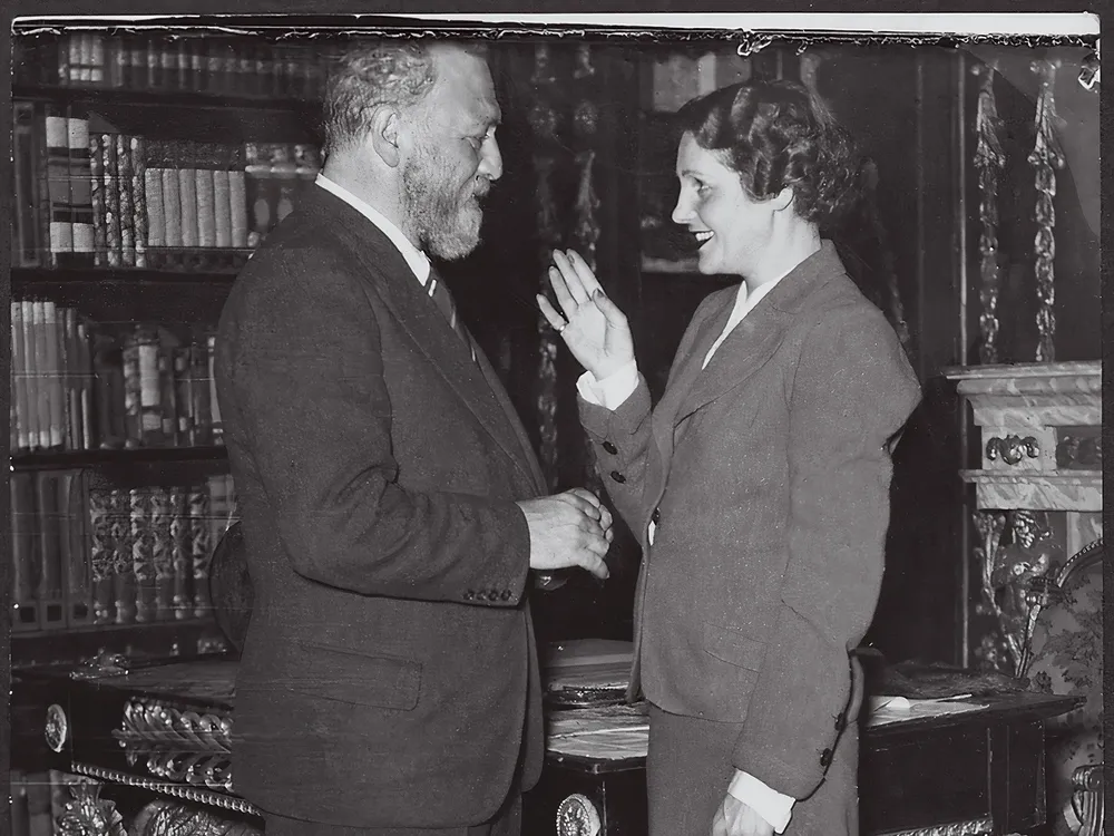 a man and woman rehearse a scene