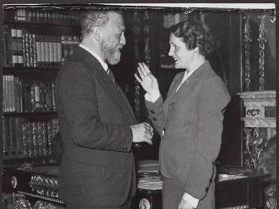 Leo Reuss rehearses with celebrated stage actress Christl Mardayn in 1937. Reuss&rsquo; bleached hair and beard were remnants of his false identity as a farmer.