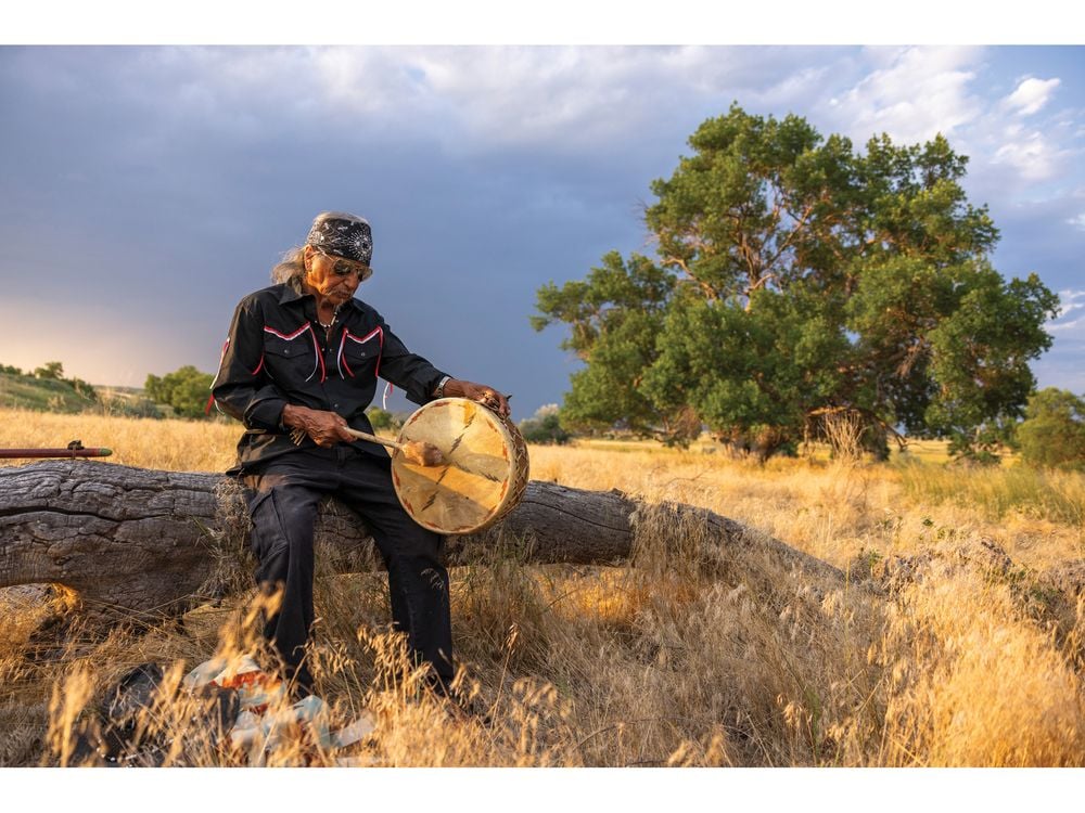 OPENER - Phil Little Thunder, a great-great-grandchild of the Lakota chief whose village was attacked in 1855. An ancient cottonwood known as the Witness Tree, right, still stands.