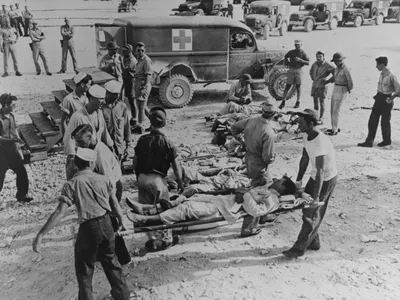 Survivors of the&nbsp;Indianapolis&nbsp;disaster en route to a hospital following their rescue in August 1945