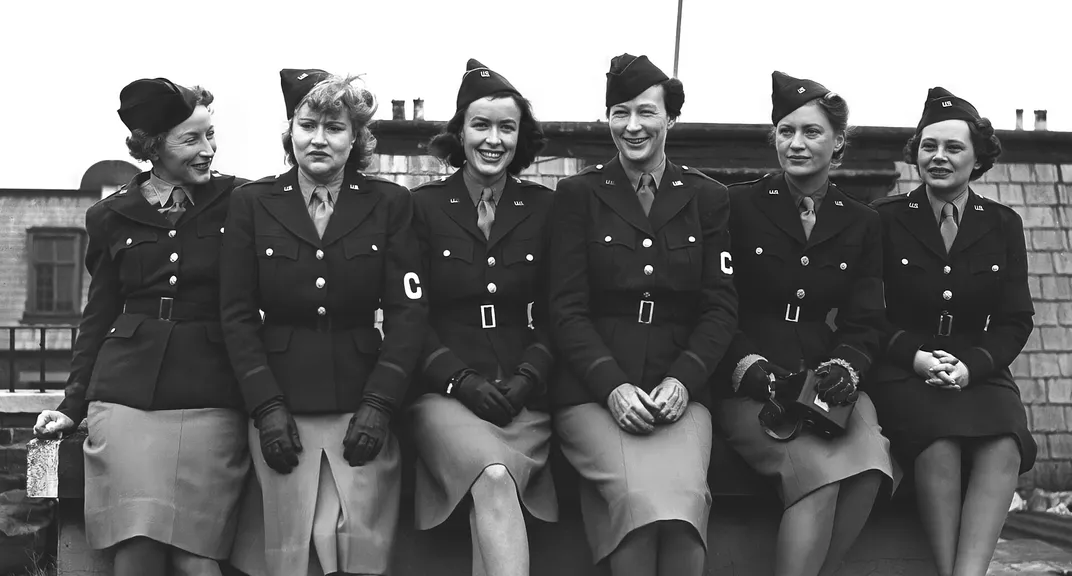 Lee Miller (second from right) with other female war correspondents in 1943