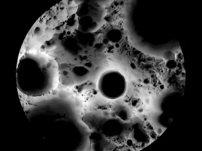 A view of the lunar south pole, with Shackleton Crater at the center, assembled from images taken by NASA&#39;s Lunar Reconnaissance Orbiter.